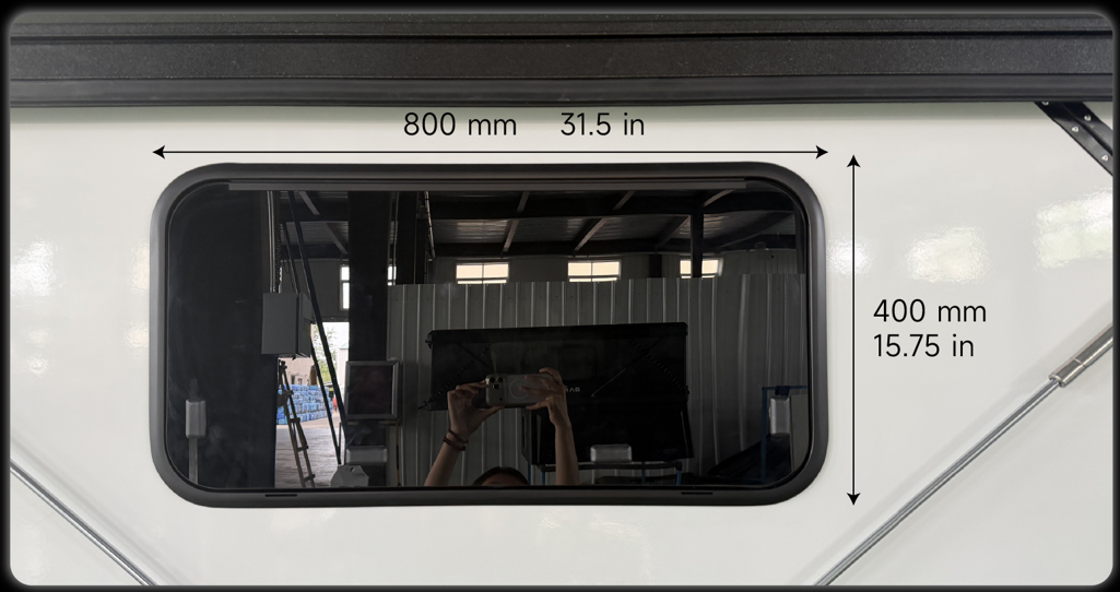 RV exit window dimensions 800mm by 400mm 31.5 by 15.75 inches closed on white camper wall