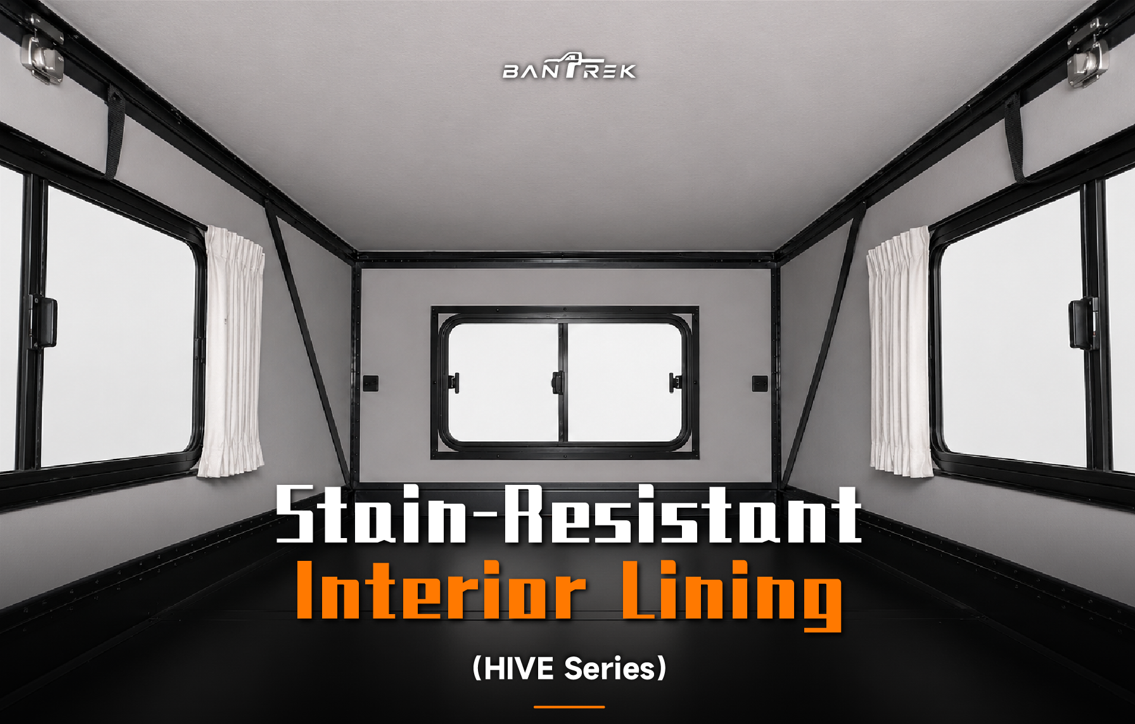 BANTREK HIVE Series camper interior with grey stain-resistant leather lining and black framed windows