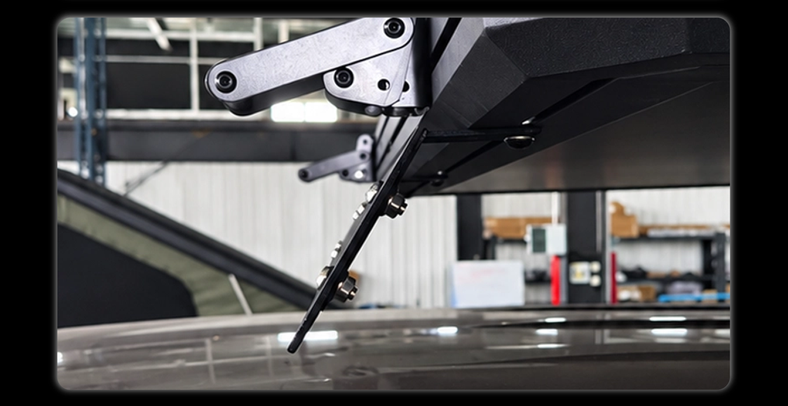 Side view of wind deflector adjustable mounting bracket with silver hinge arms and bolt connection